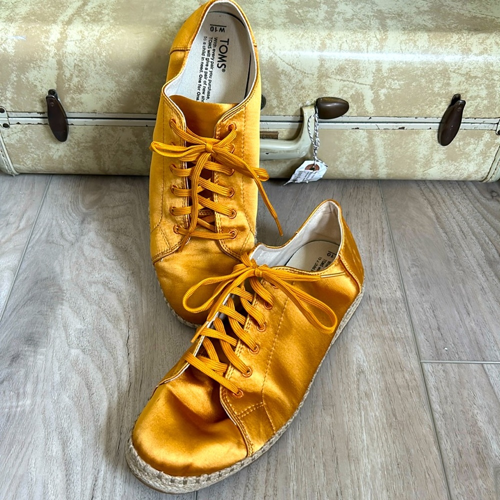 Gold satin TOMS sneaker size 10